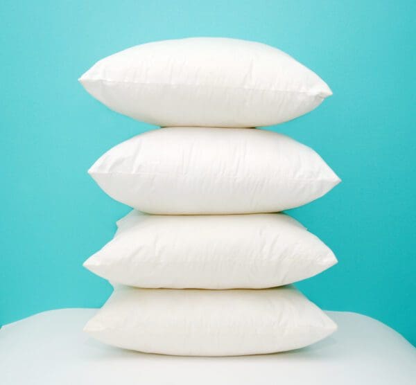 A stack of pillows on top of each other.