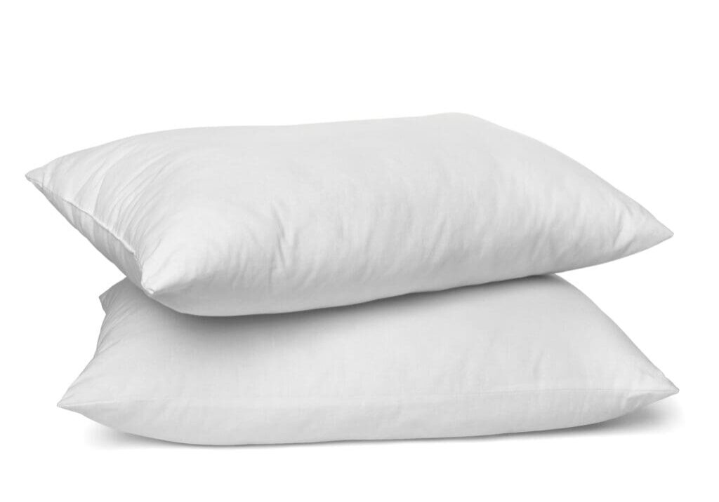 Two pillows are stacked on top of each other.